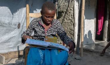 Material escolar para un niño de Haití.