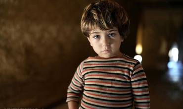 Un niño libanés en un asentamiento informal