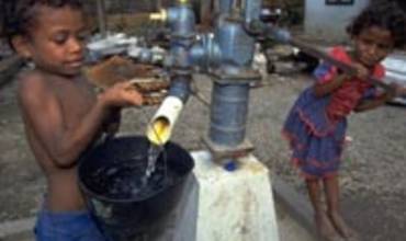 UN VASO MEDIO VACÍO PARA UNA QUINTA PARTE DE LOS NIÑOS Y NIÑAS DEL MUNDO