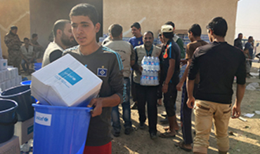 Mosul: distribuimos agua potable en el frente de batalla